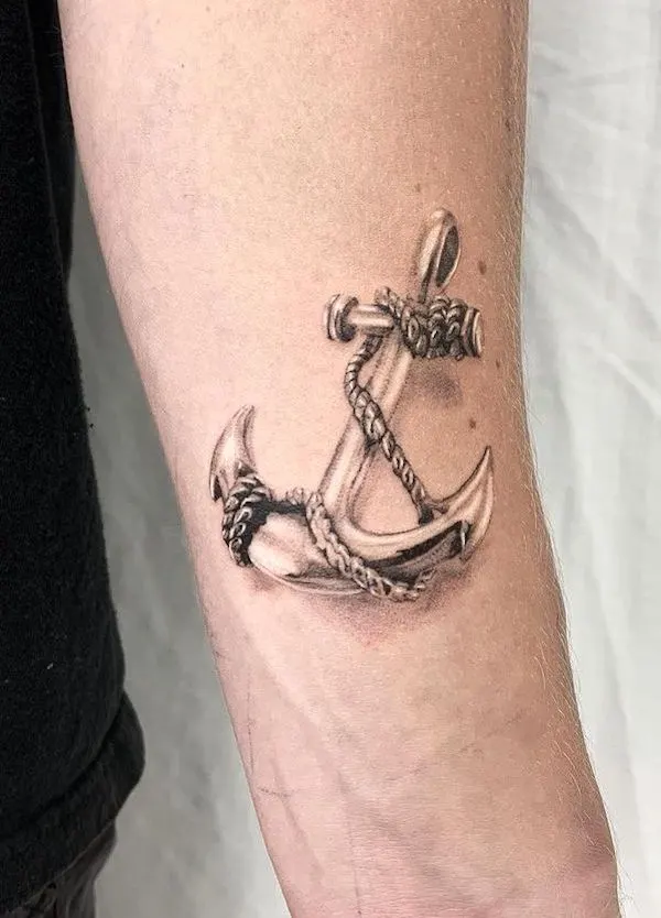 Golden anchor tattoo