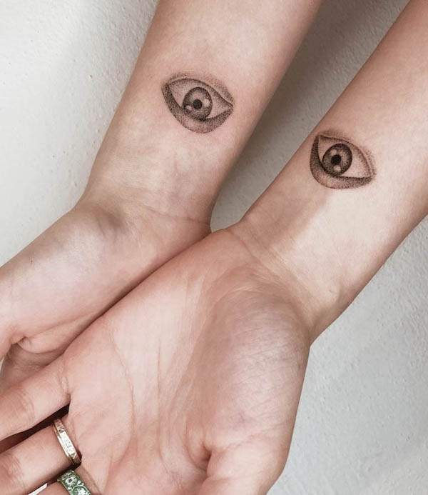 Matching eyes on the wrist tattoo