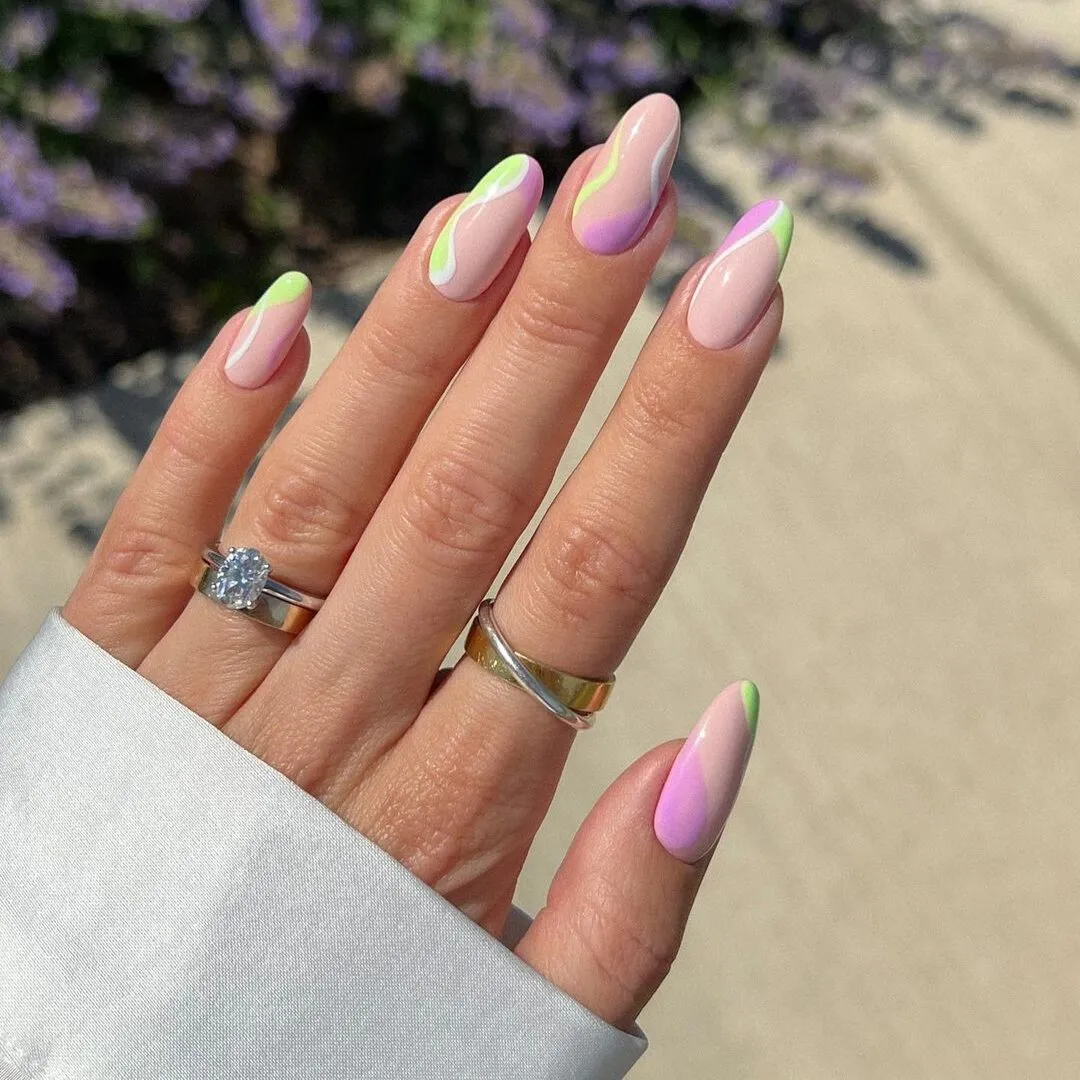 green, purple and white swirls nails