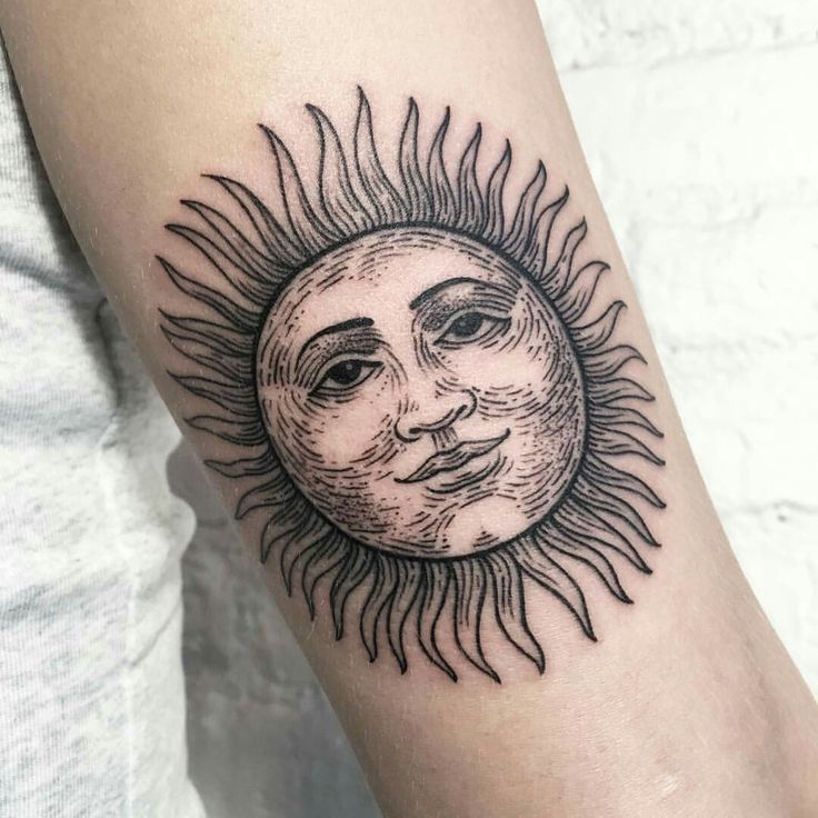 Classy Sun Face Tattoo