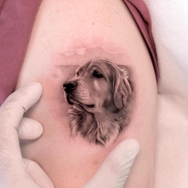 Black and grey golden retriever tattoo