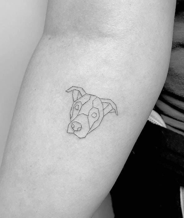 Minimalist single-needle dog tattoo