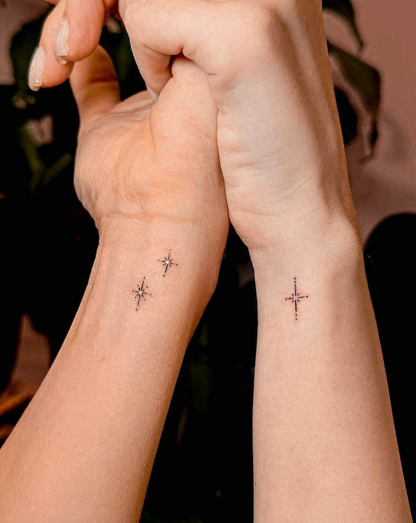 Matching star tattoos