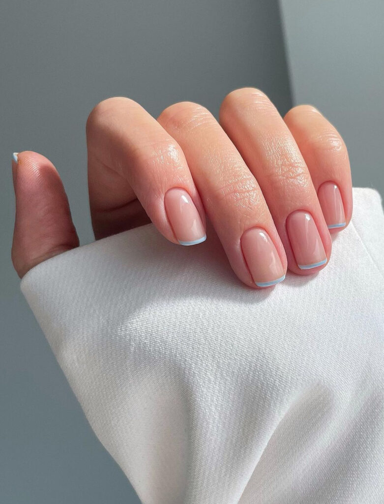 Square nails with minimalist pastel blue tips