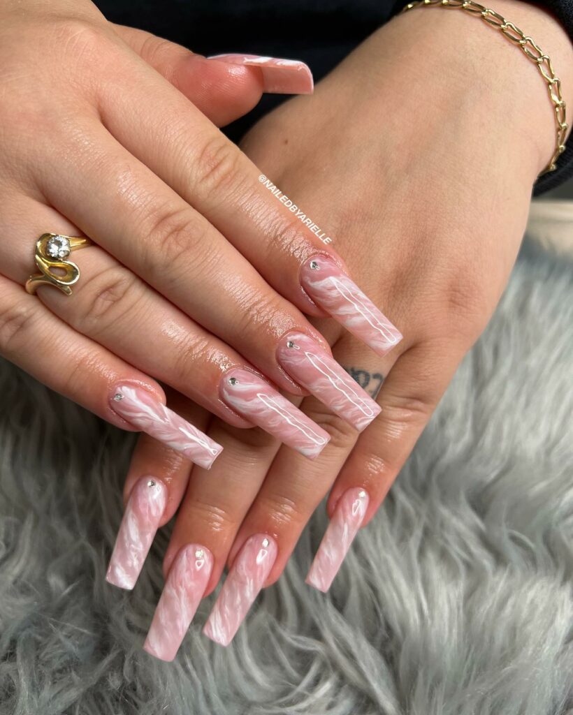 Glossy Pink Marble Nail Design with Gems