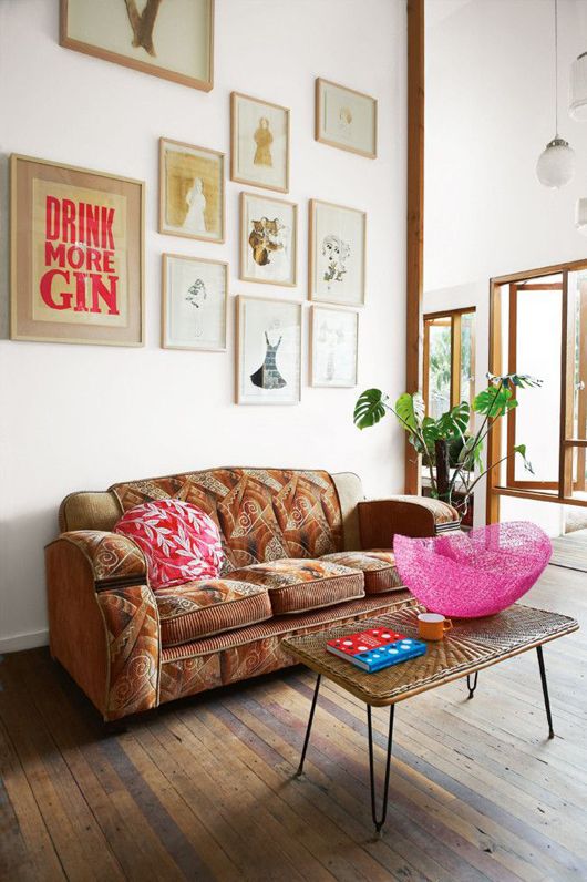 Retro Boho Living Room with Bold Art and Quirky Accents