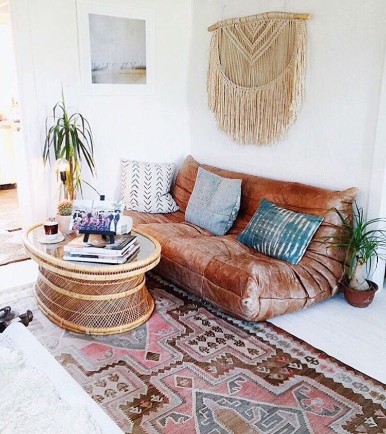 Bohemian Living Room with Warm, Earthy Tones and Artistic Details