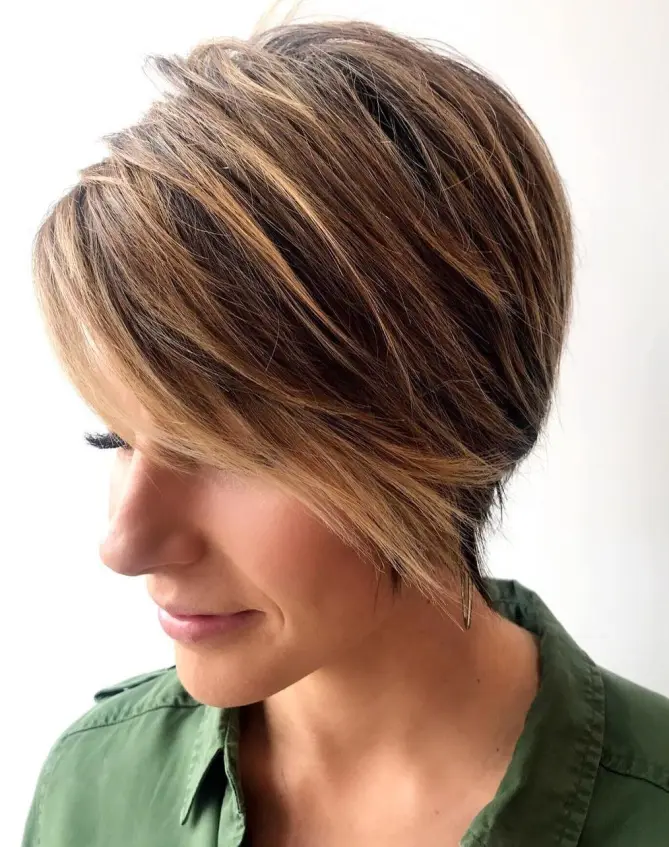 Chic Pixie with Long Bangs and Blonde Balayage