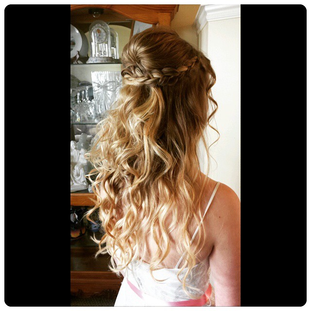 Prom updo with pretty curls and braids