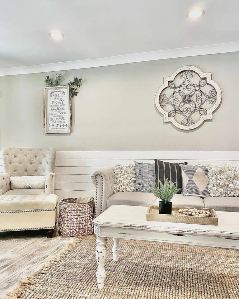 White Shiplap Walls and Distressed White Coffee Table for a Farmhouse Look