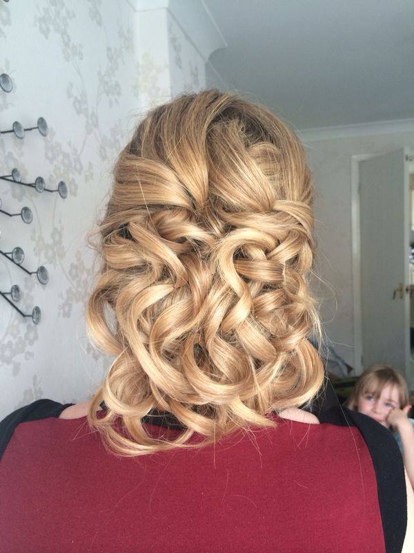 messy curly updo hairstyle