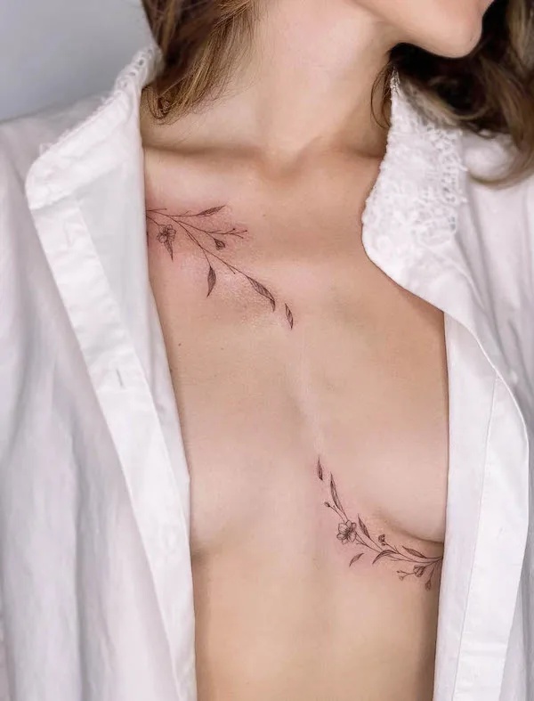 Asymmetrical branch chest tattoo