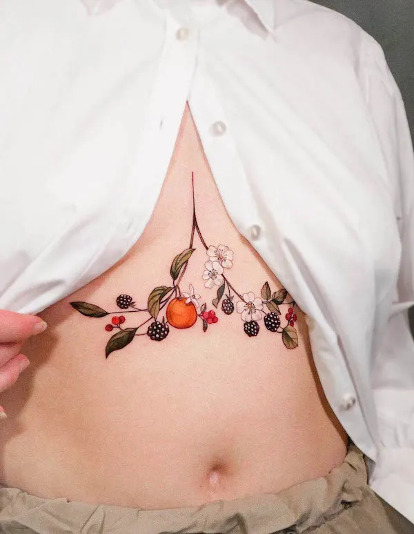 Feminine botanical underboob tattoo