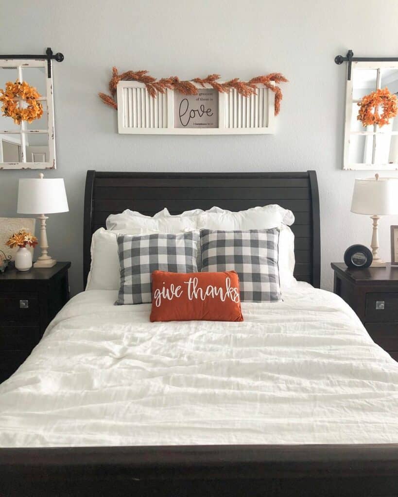 Tiny Orange Wreaths Flanking Sleigh Bed