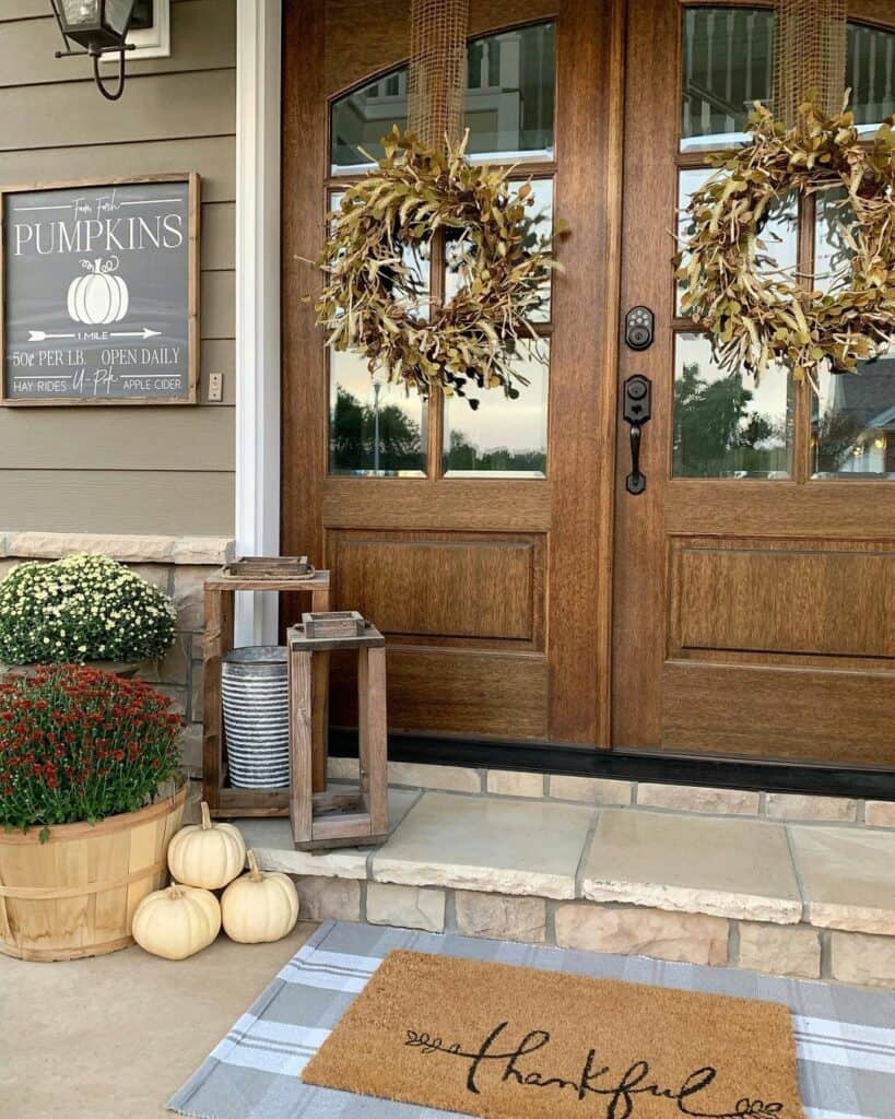 Twin Giant Wreaths on Wooden Front Doors