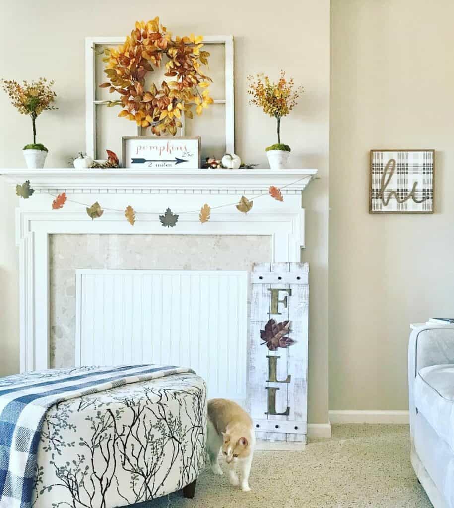 Yellow Wreath Decorating White Mantelpiece