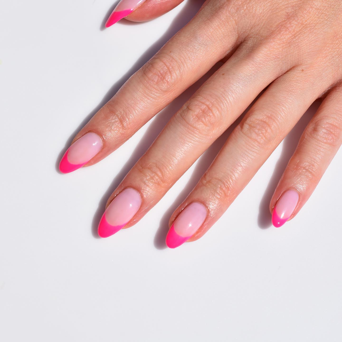 Elegant Hot Pink French Tips on Almond Nails