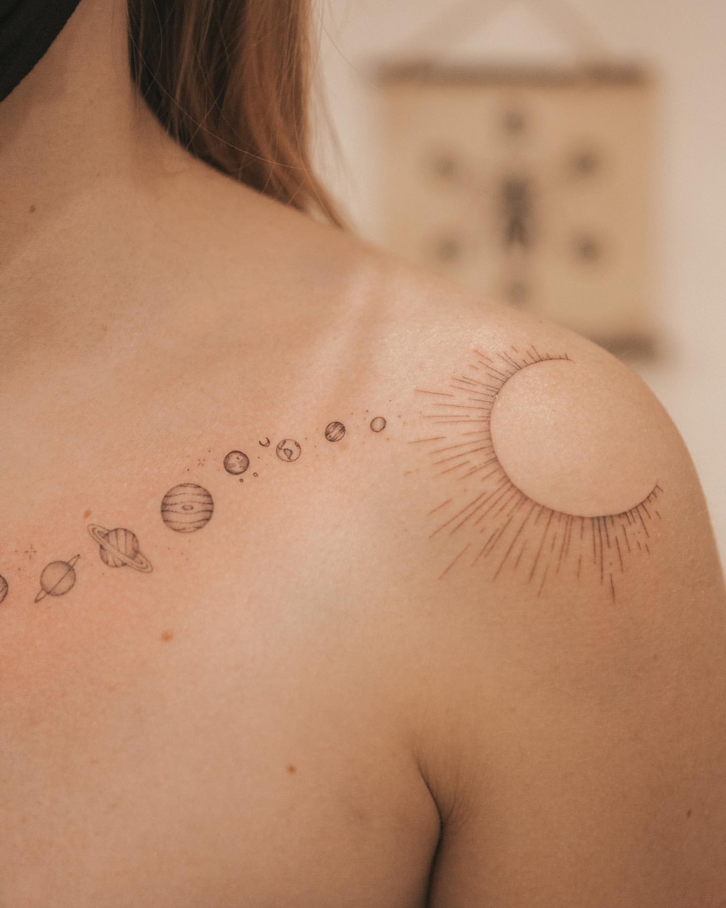 Minimal Tattoo of Sun and Solar System