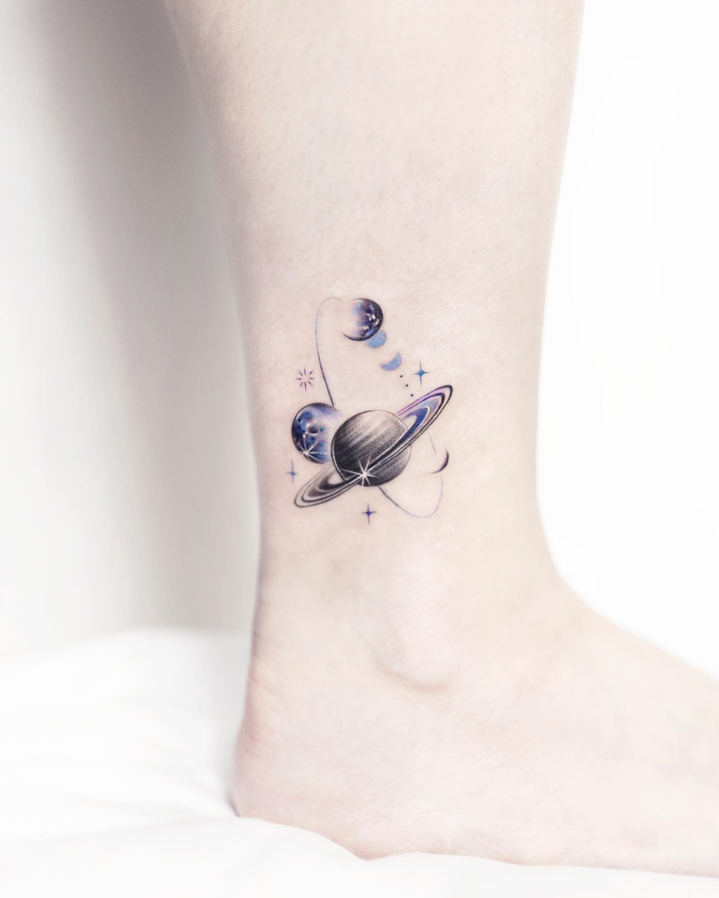 Simple Color Ankle Tattoo of Planets