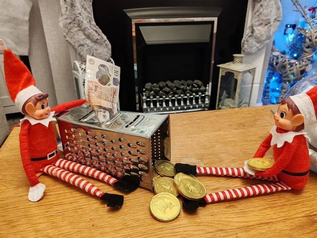 Elves grating chocolate coins