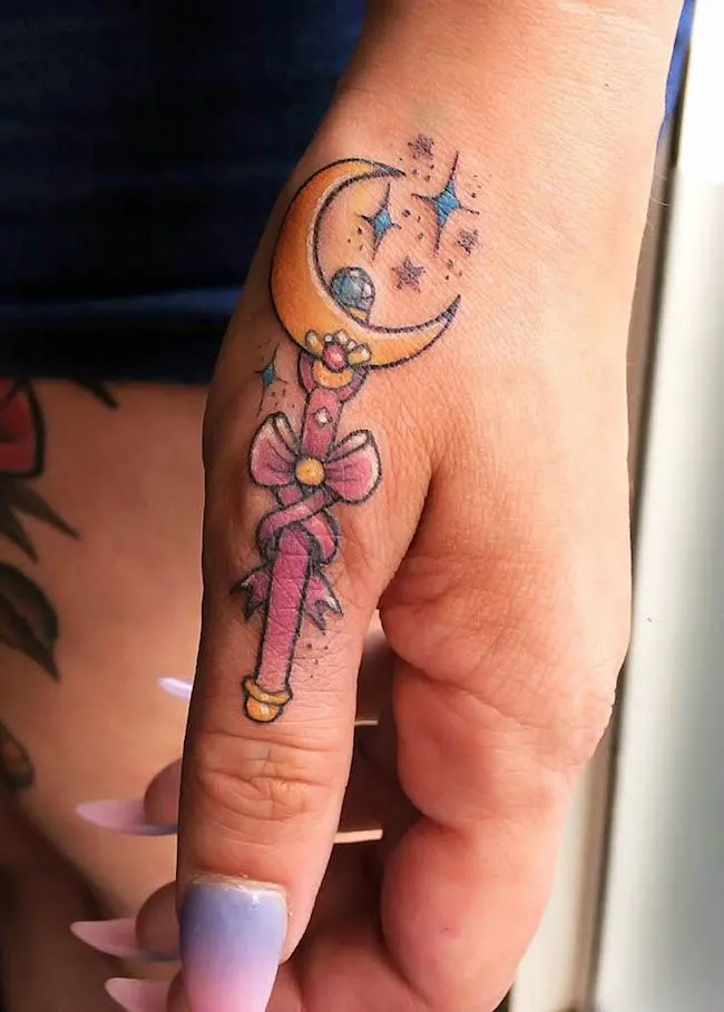 A magical Sailor Moon wand tattoo