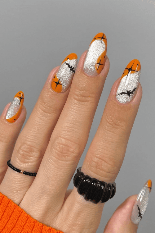 Spooky orange & silver nails