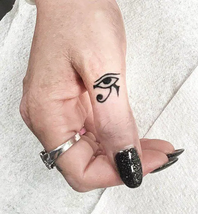 The Eye of Horus thumb tattoo