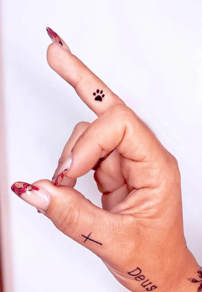 Tiny paw tattoo for dog lovers