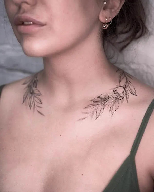 Botanical necklace tattoo

