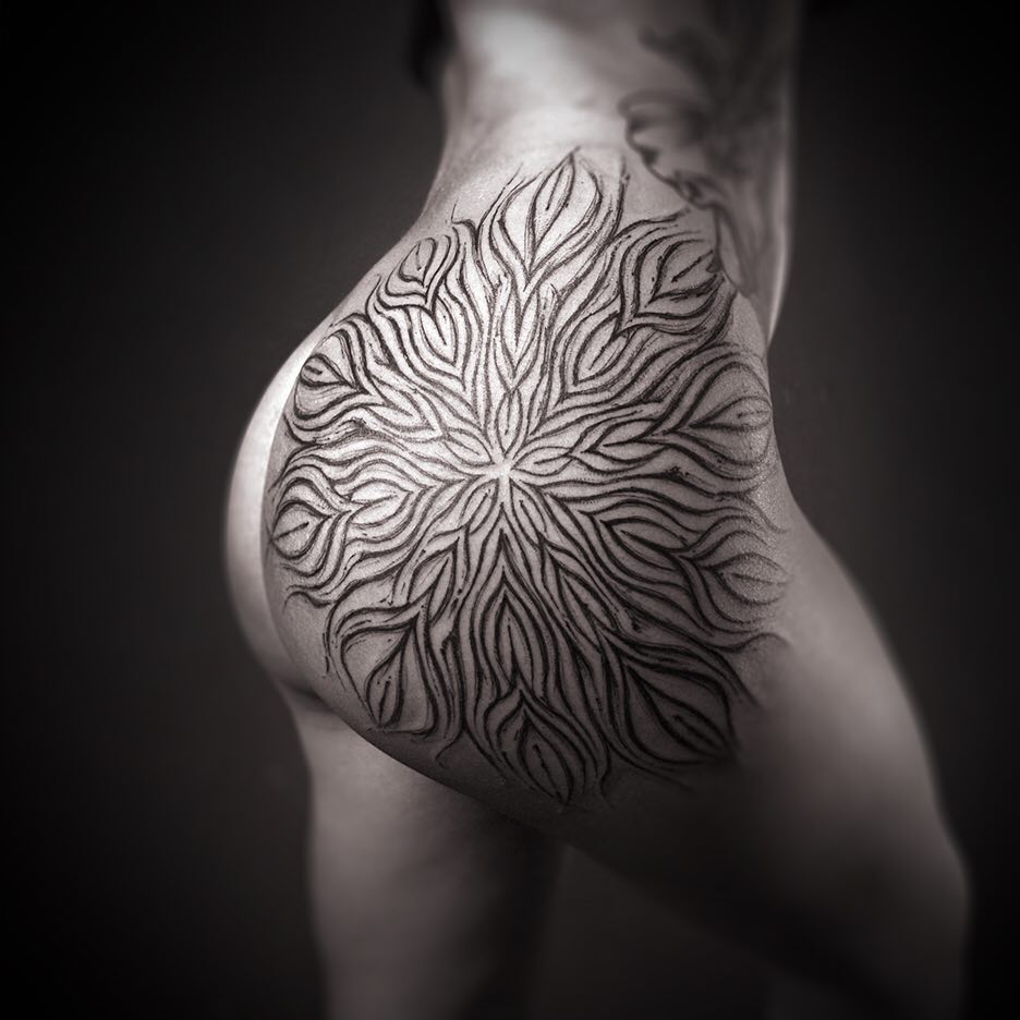 Dynamic Black Dot And Line Work Tattoo On Hip