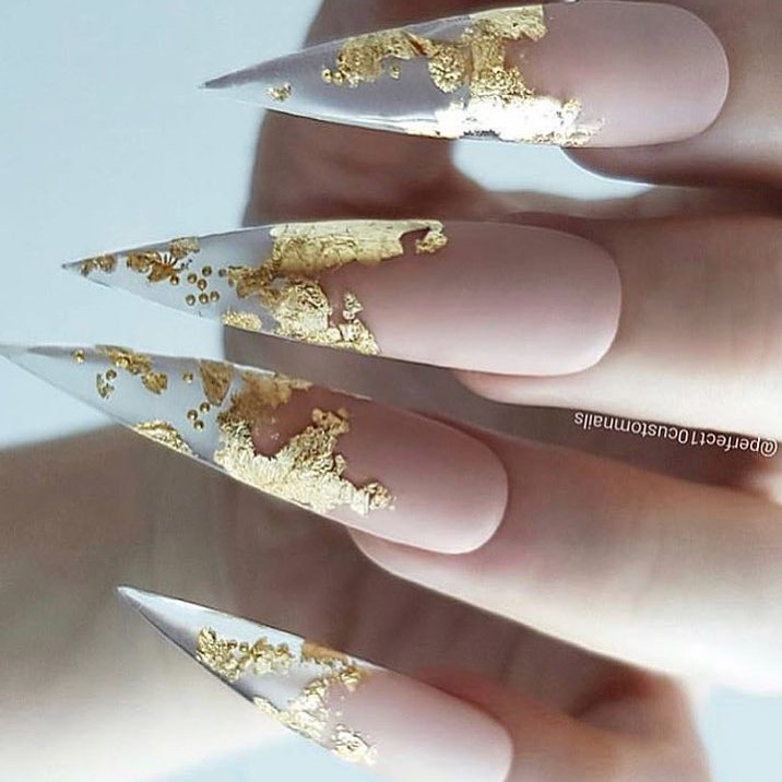 Edgy Golden Foil Stiletto Nails