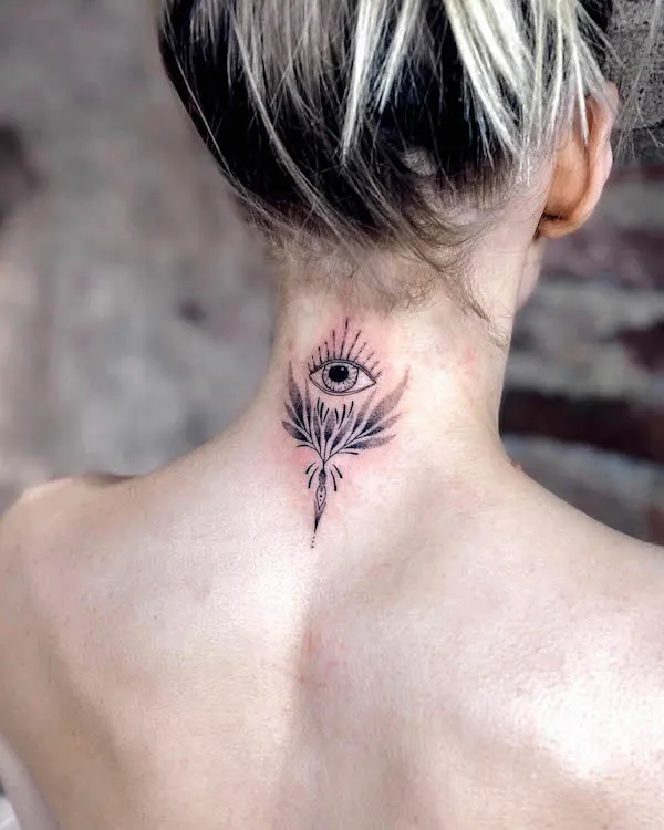 Eye tattoo on the back of neck
