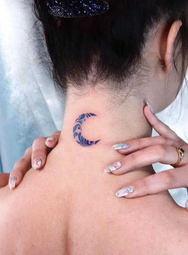 Feminine moon tattoo
