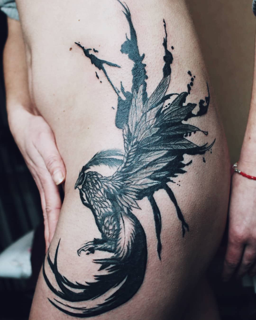 Fenix Black Tattoo On Side Hip