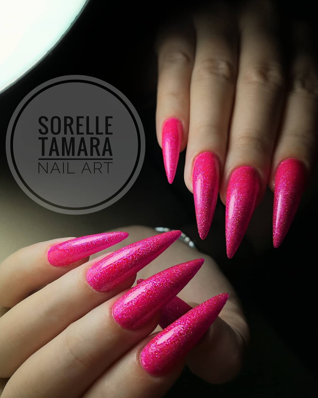 Glossy Bright Pink Stiletto Nails