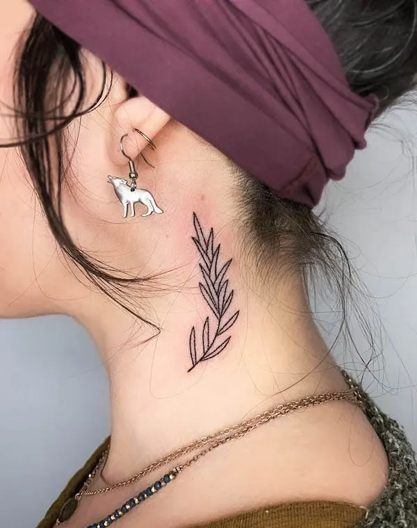 Simple black leaves side of the neck tattoo
