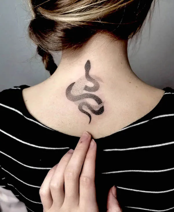 Snake and moon neck tattoo
