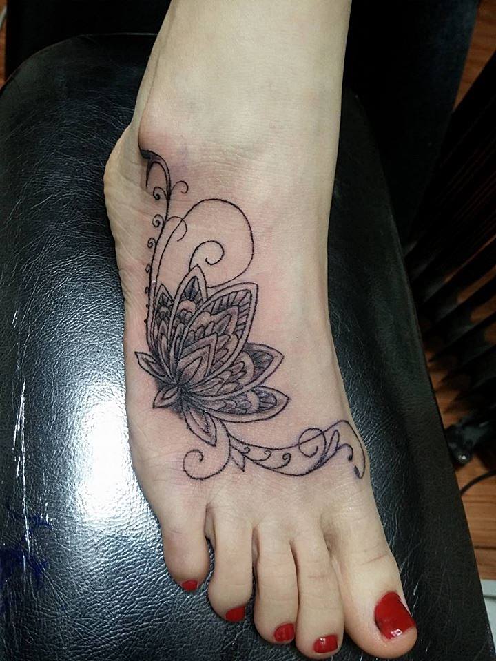 Attractive lotus flower tattoo design for girls