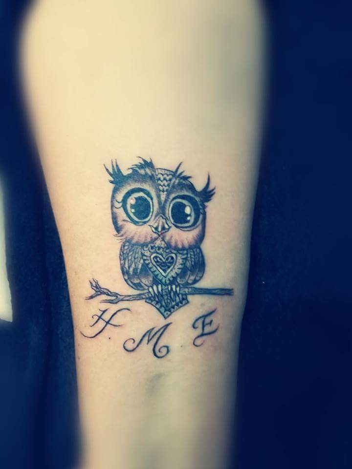 Awesome Little Owl With Heart And Letters Tattoo