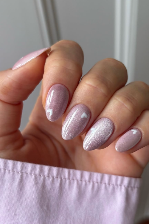 30 Creative Nail Art Ideas: Unlock Stunning DIY Designs at Home! 15 Blush Pink Cat Eye Nails With Tiny Hearts