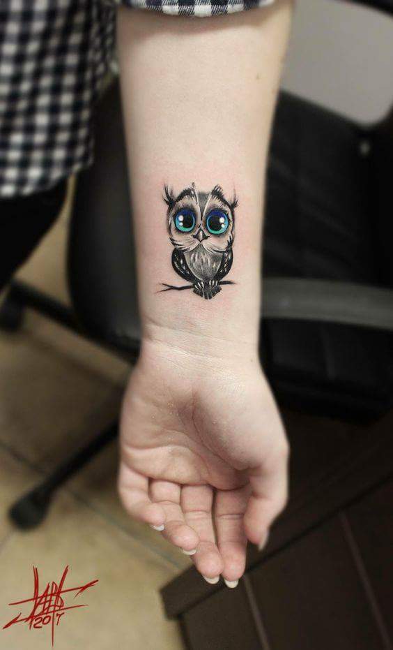 Charming Blue Eyes Owl Wrist Tattoo