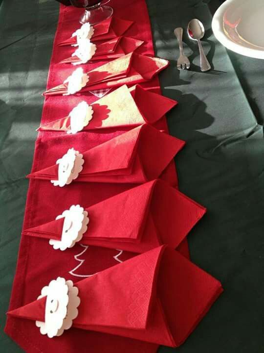 Classic napkin folding with Santa holding face.