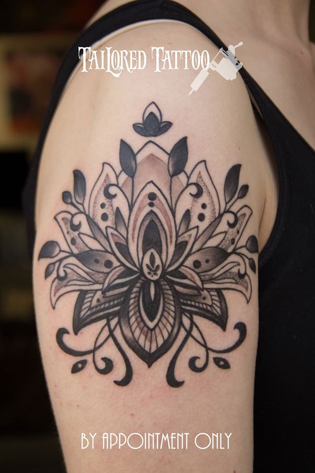 Lotus flower design tattoo