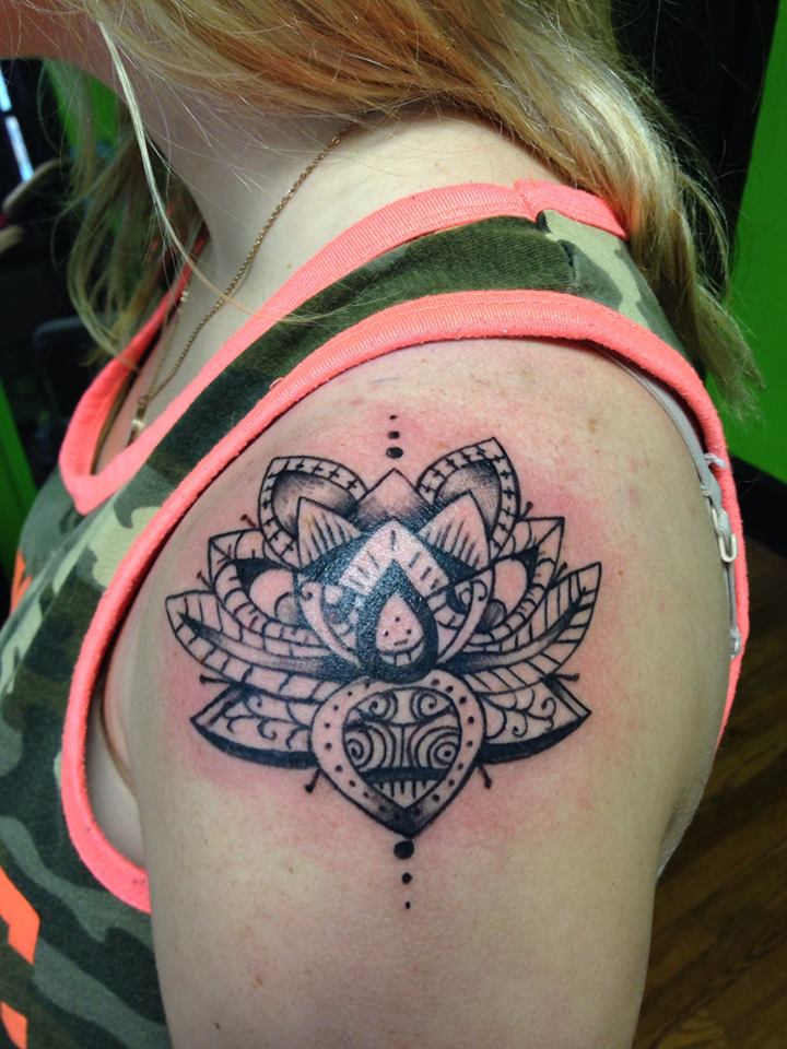 Lotus flower shoulder piece tattoo