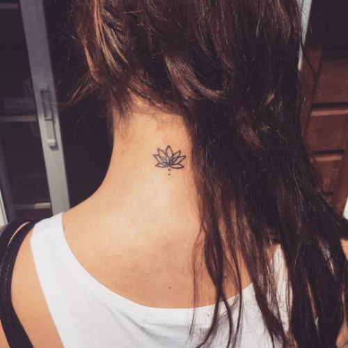 Simple and small lotus flower tattoo