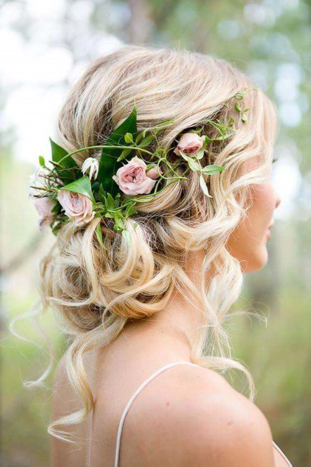 Splendid hairstyle for brides with floral accessory