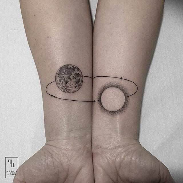 Sun Moon Spinning Tattoo in the Planets Orbit