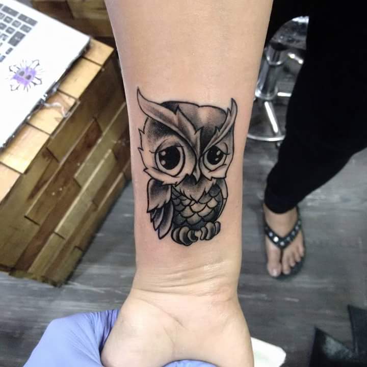 Very Charming Tattoo Of Baby Owl On Wrist