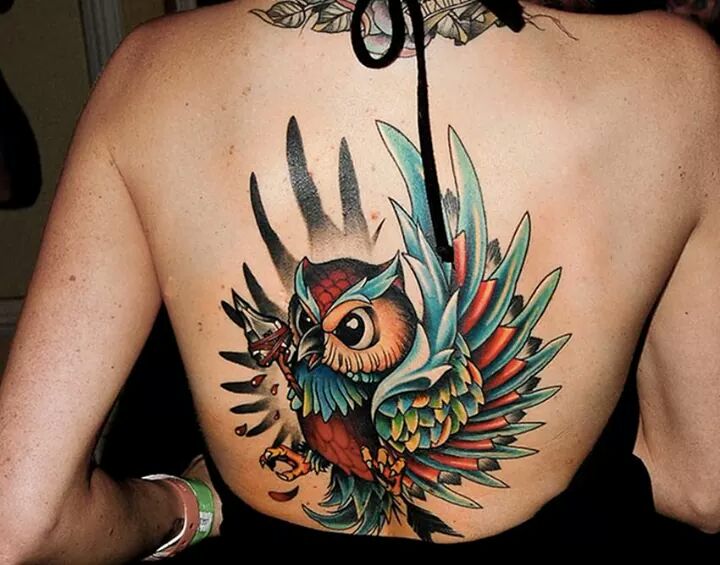 Vibrant Flying Owl With Lovely Colors Tattoo