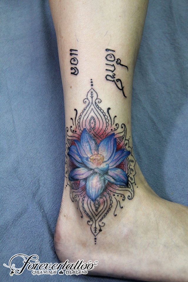 ankle lotus flower tattoo